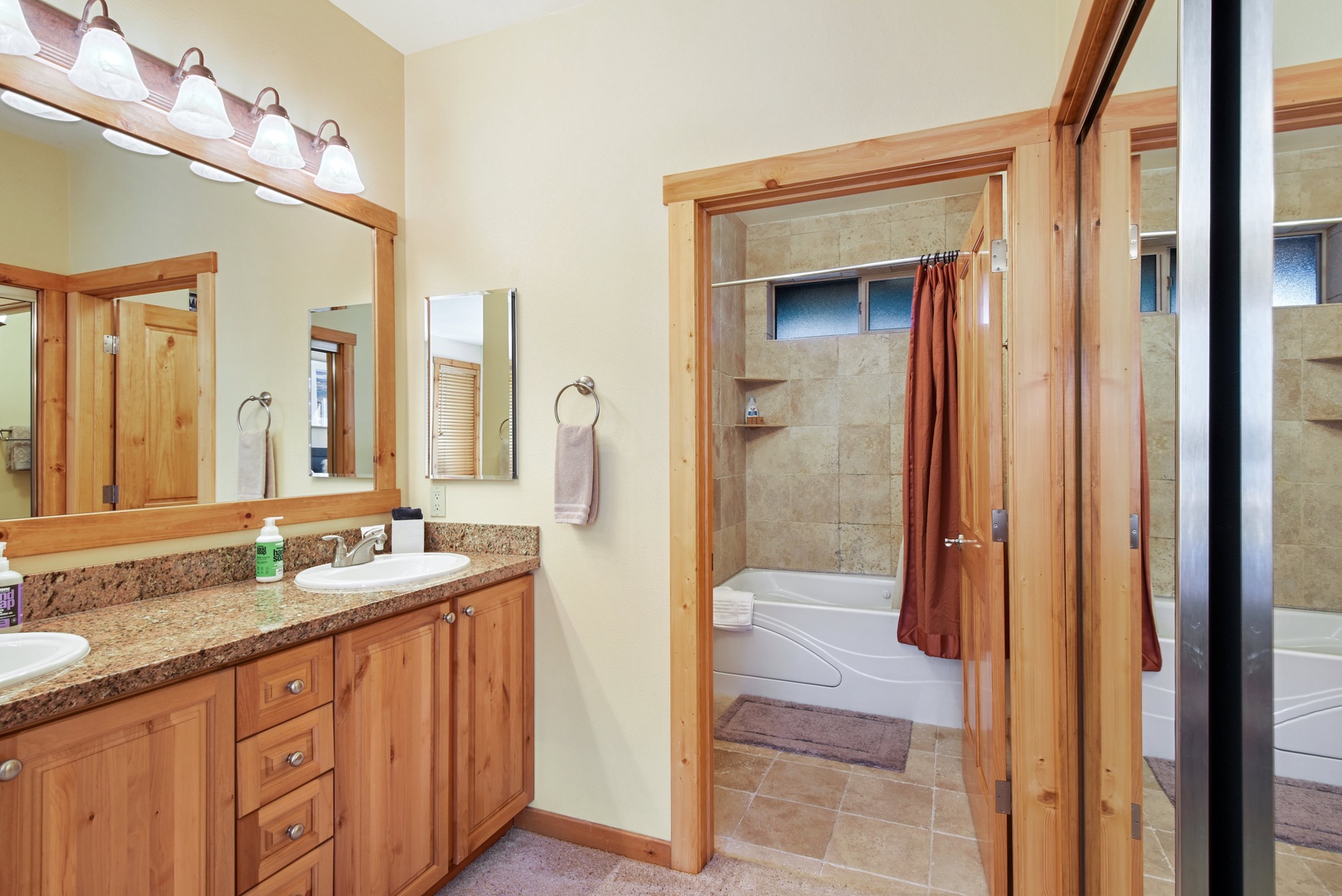 Master bathroom: dual sinks, shower/tub combo
