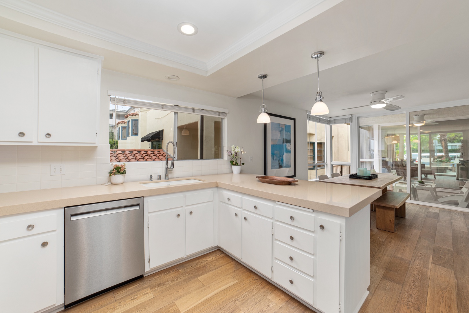 The open, airy kitchen offers ample space & every home comfort