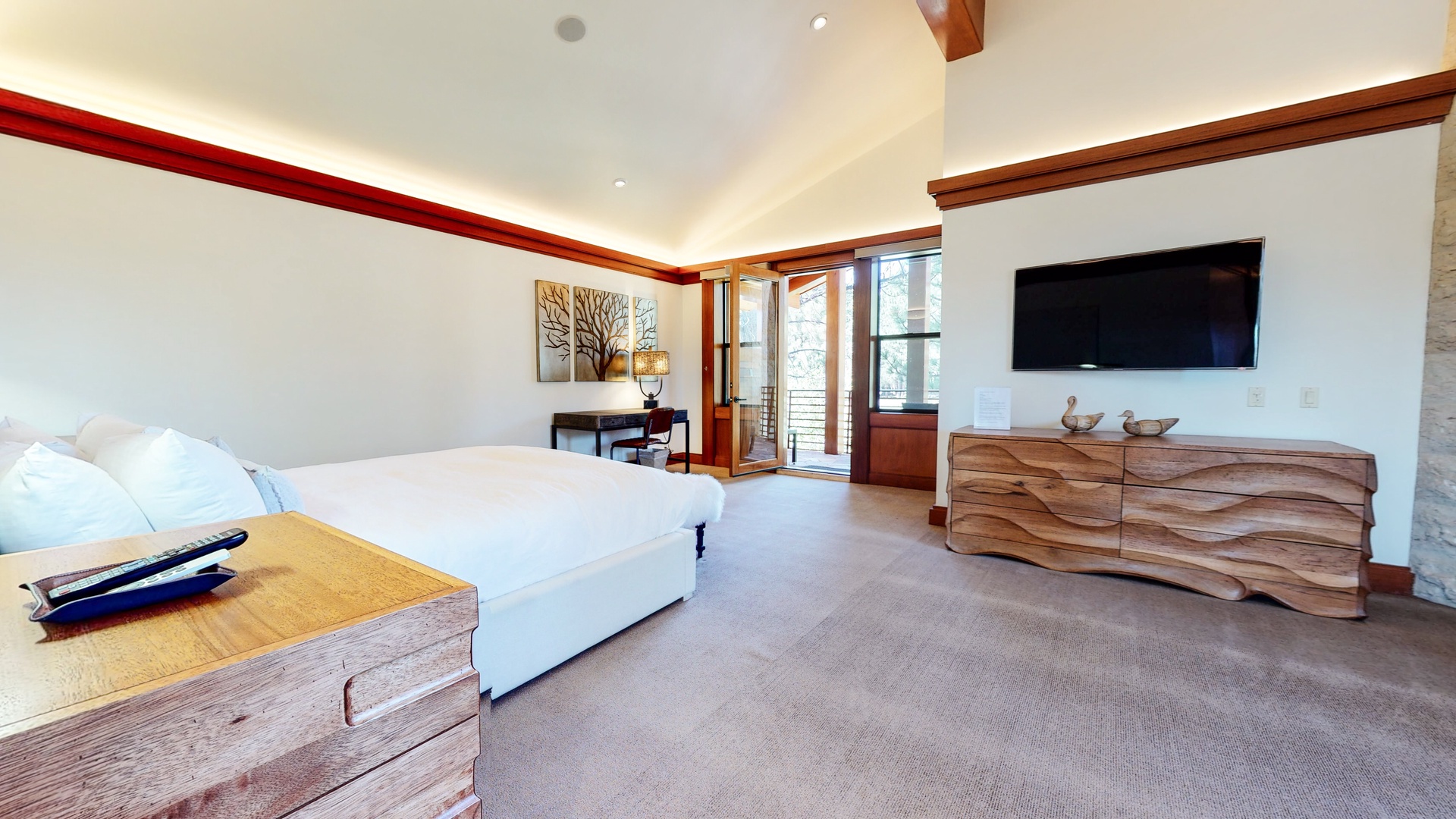 Bedroom 2 Master suite with King bed, TV, fireplace, desk, private en-suite, and deck  (3rd floor)