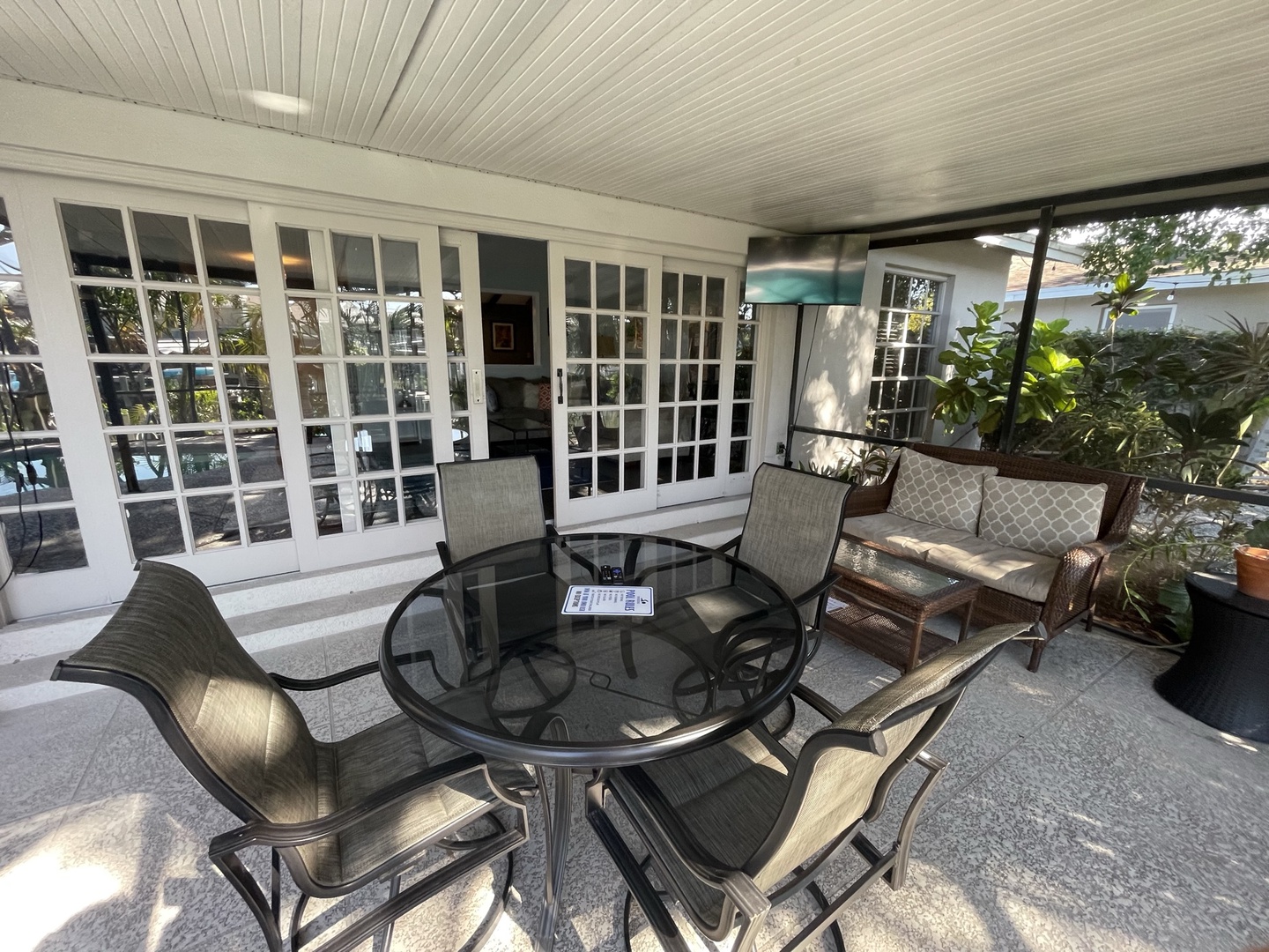 Lounge the day away or dine alfresco on the shaded back patio