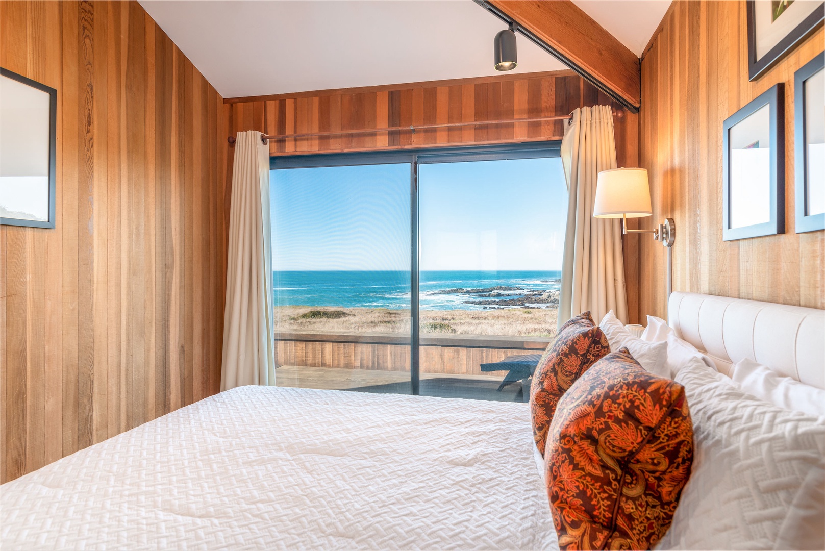 Bedroom 3: Queen bed with deck access and ocean views