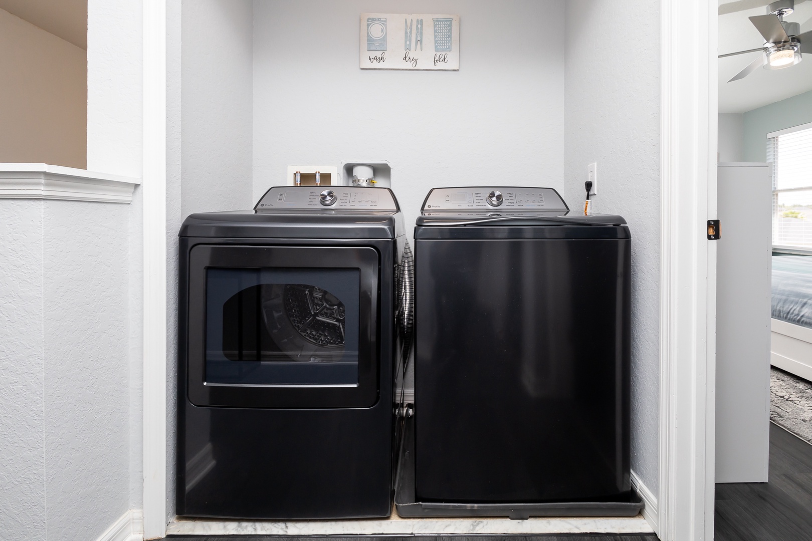Private laundry is available for your stay, tucked away on the second level