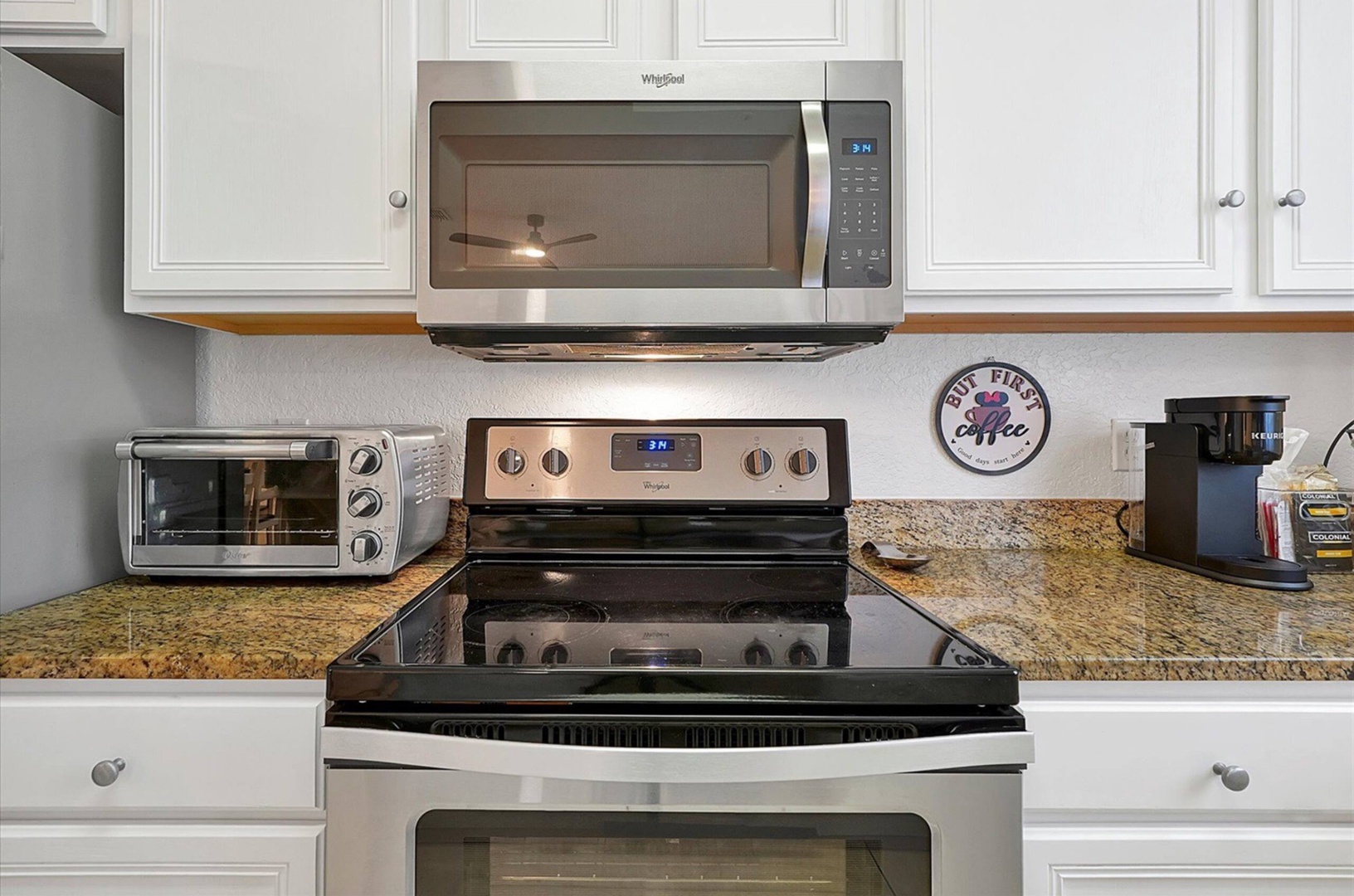 The open, airy kitchen offers ample space & all the comforts of home