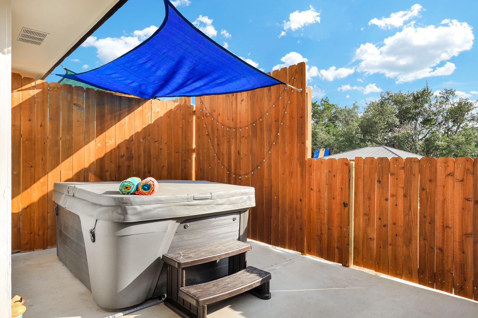 Soak your cares away on the secluded patio in your very own private hot tub