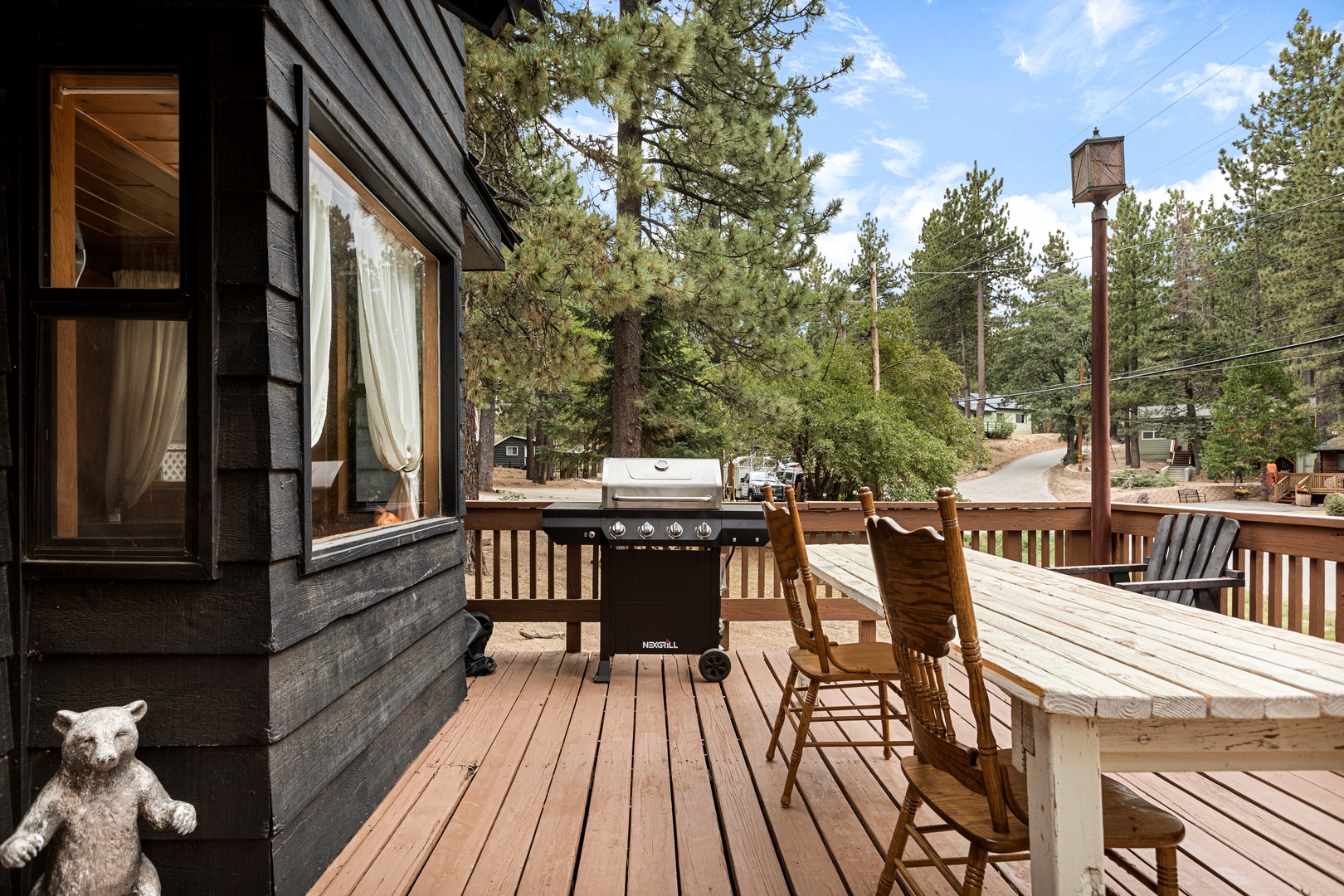 Deck with outdoor seating and grill