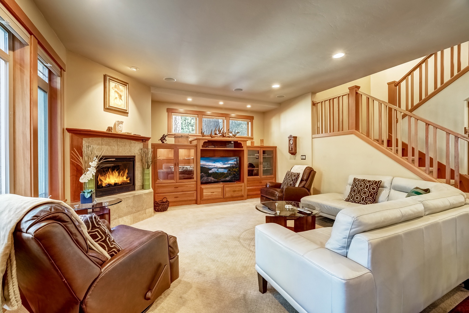 Open living space with gas fireplace, and TV