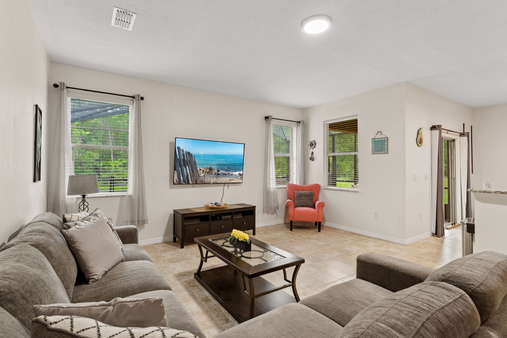 Living area with cozy seating and Smart TV