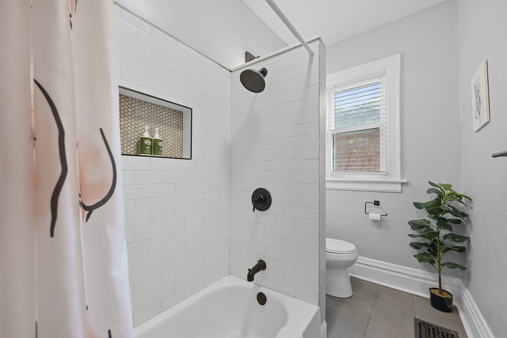 Wash up in Apartment 1164’s full bath, offering a single vanity & shower/tub combo