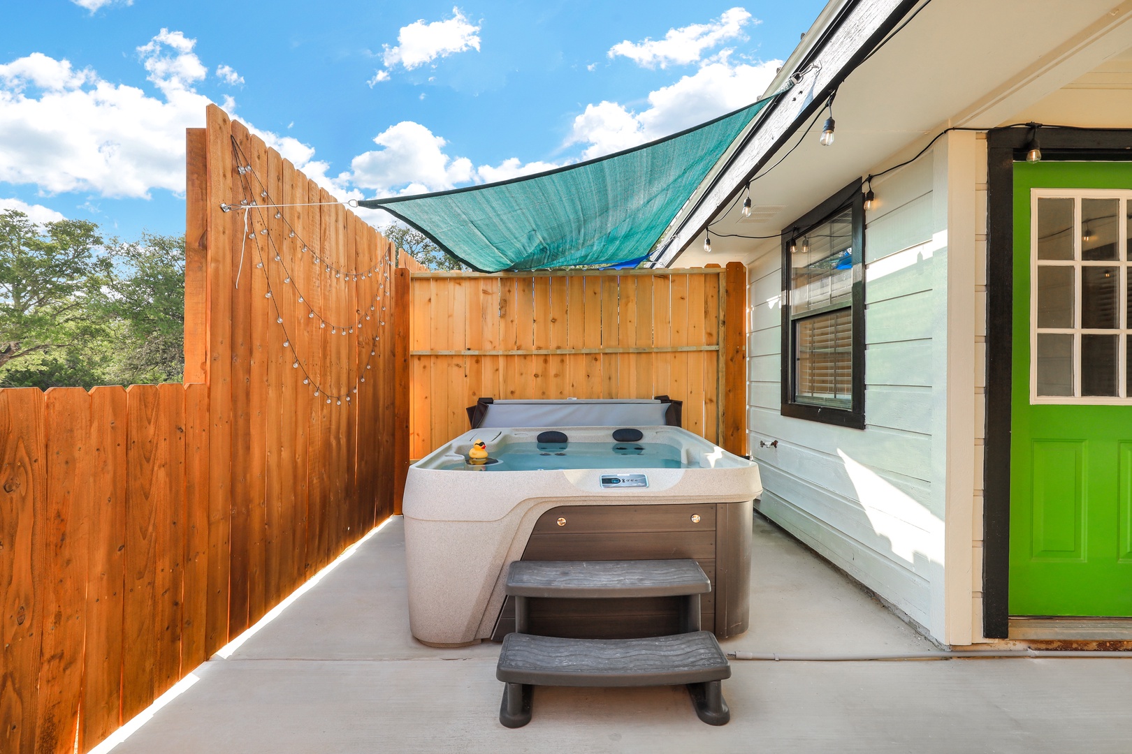 Kick back & relax on the patio or soak in the private hot tub