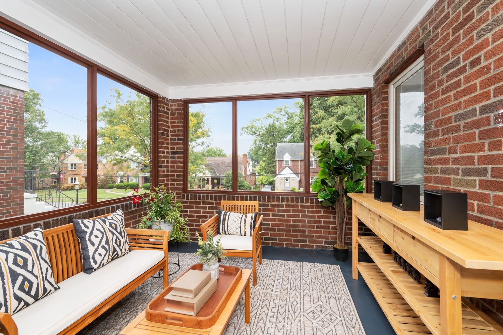 Lounge the day away in the fresh air on the enclosed porch