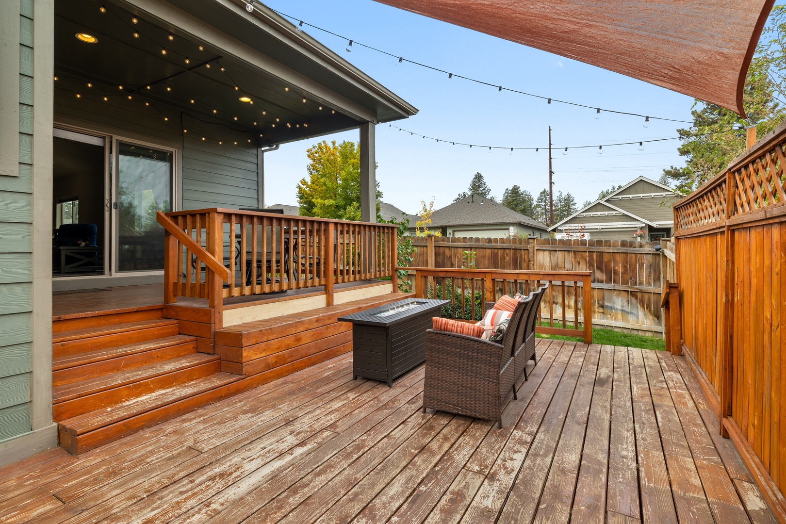 Unwind at the fire table on the back deck & make memories together