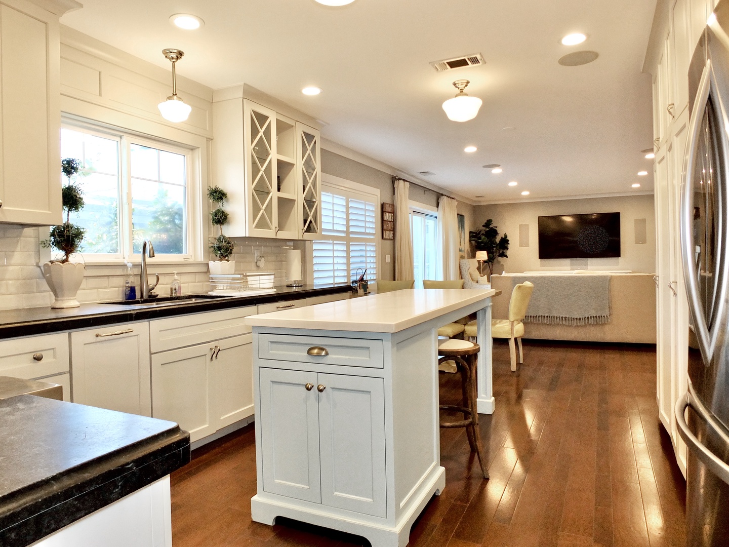The chic kitchen is a chef’s dream, providing all the comforts of home
