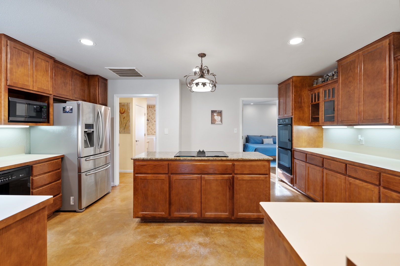 The kitchen is spacious and open, with all the comforts of home