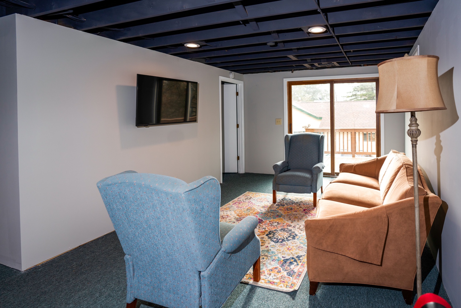 The lower-level lounge & game room areas are ideal for a fun-packed night in
