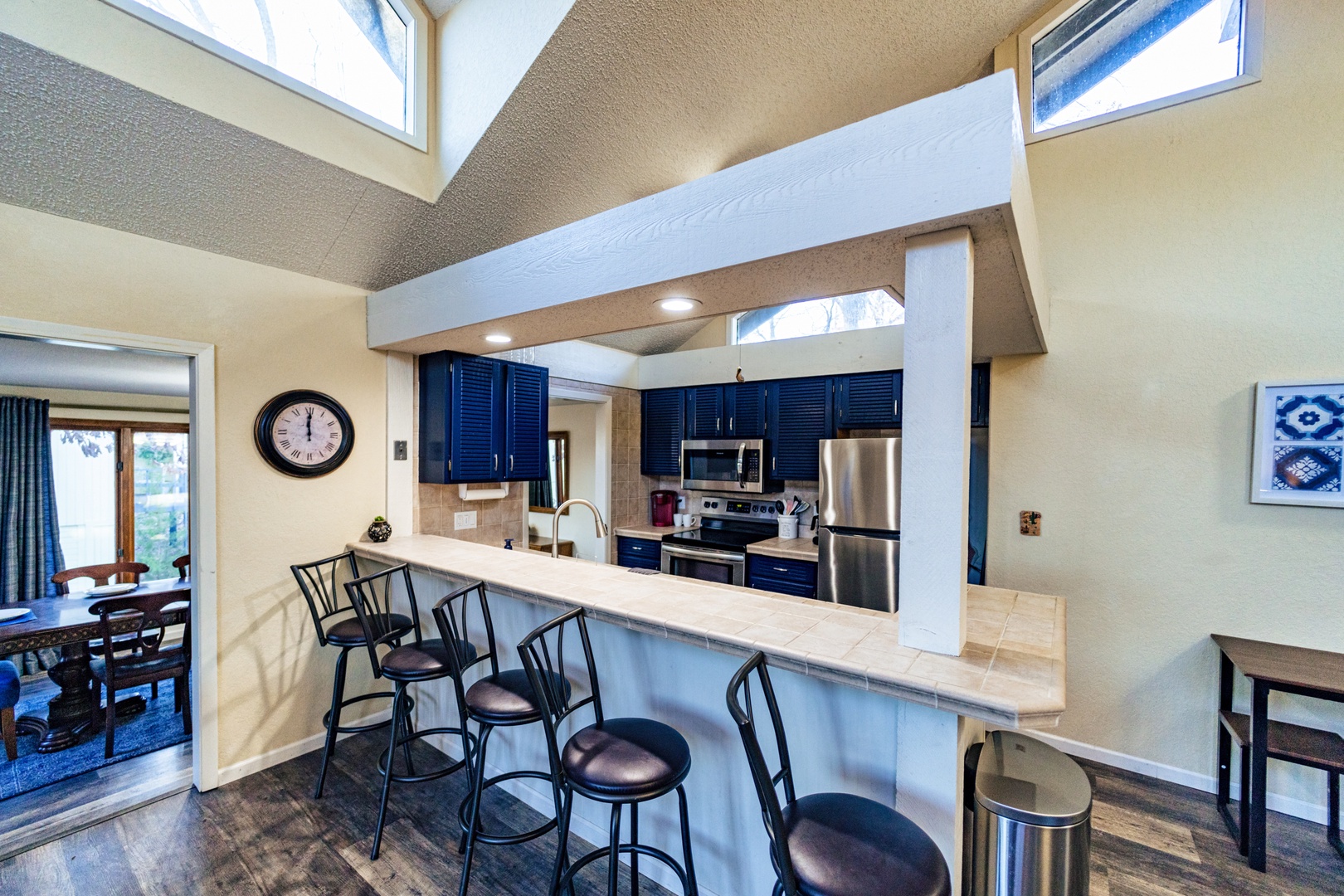 Sip morning coffee or grab a bite at the kitchen counter, with seating for 5