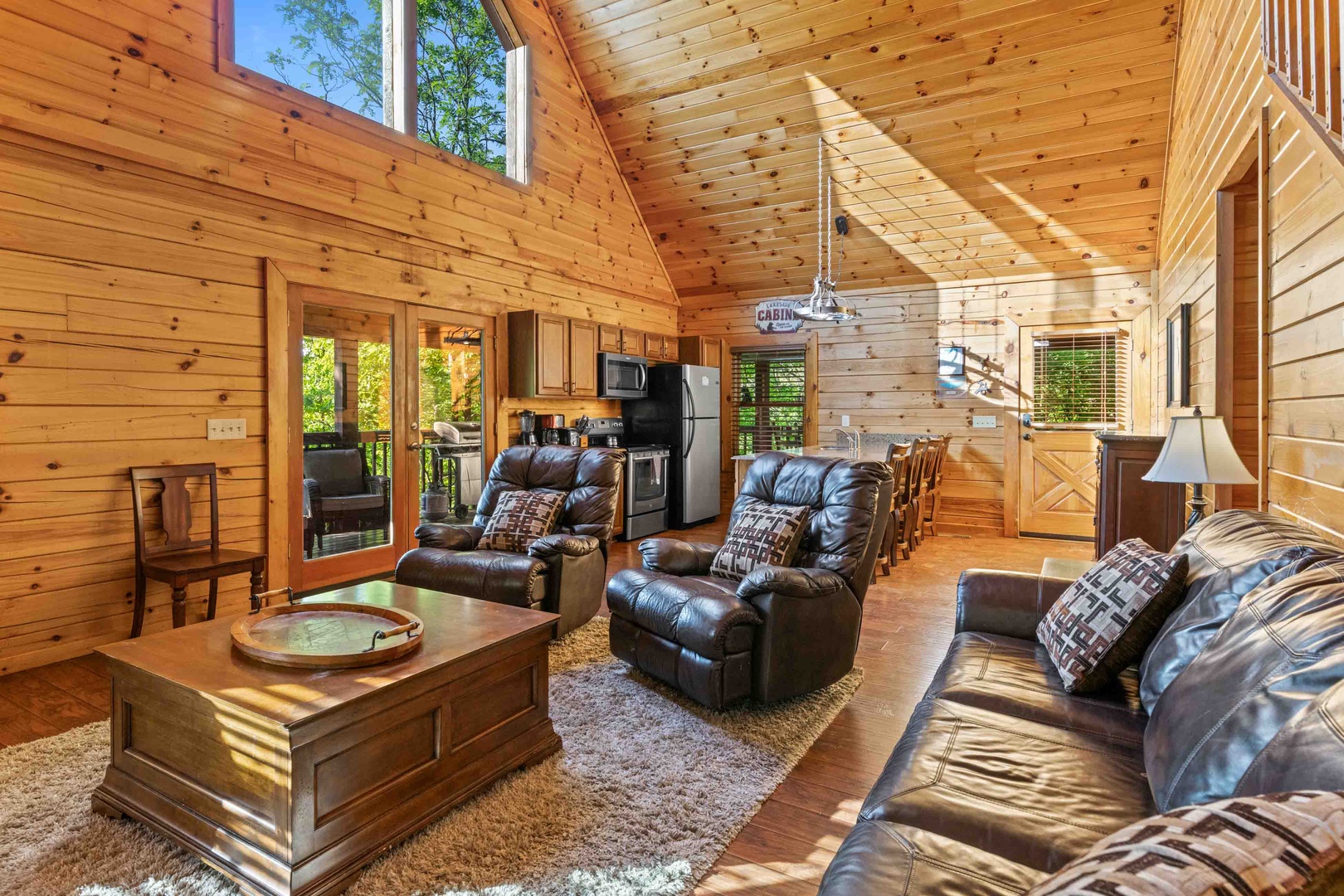 Living area with ample seating, Smart TV, and fireplace