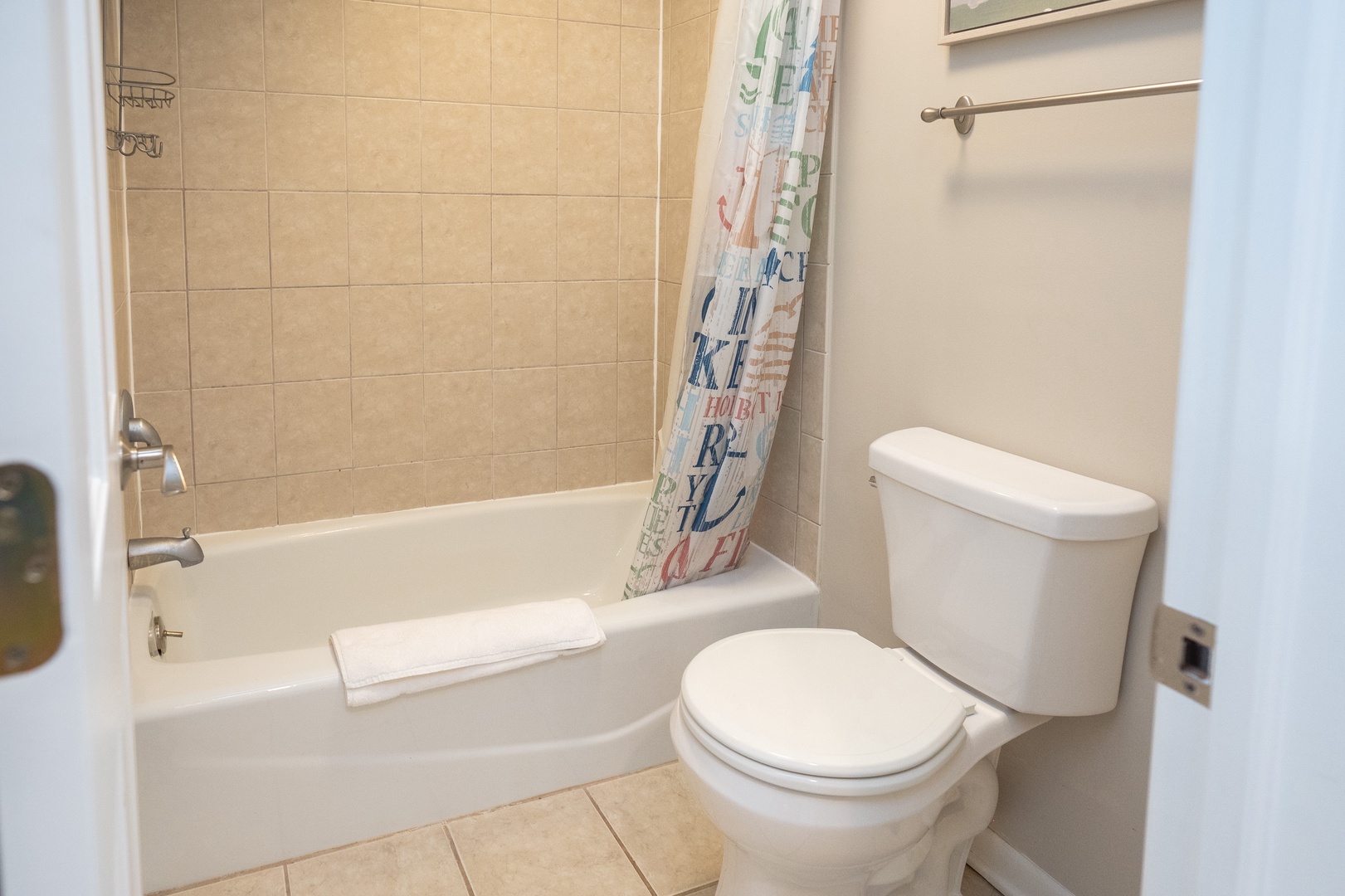 The full bathroom offers an oversized vanity & shower/tub combo