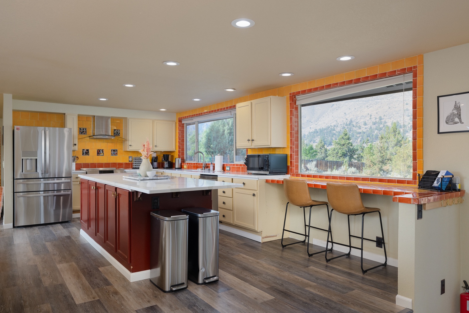 The warm, inviting kitchen offers ample space & every home comfort