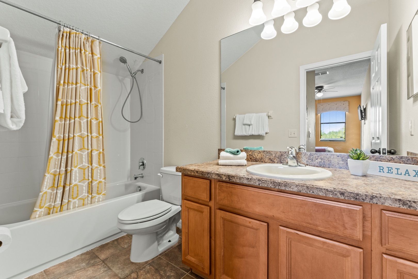Private ensuite with a convenient shower/tub combo