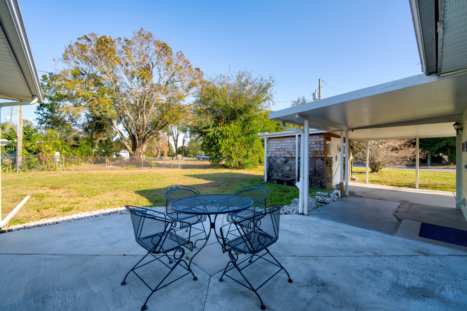 Unwind with a good book or savor a drink in the serene privacy of the patio area.