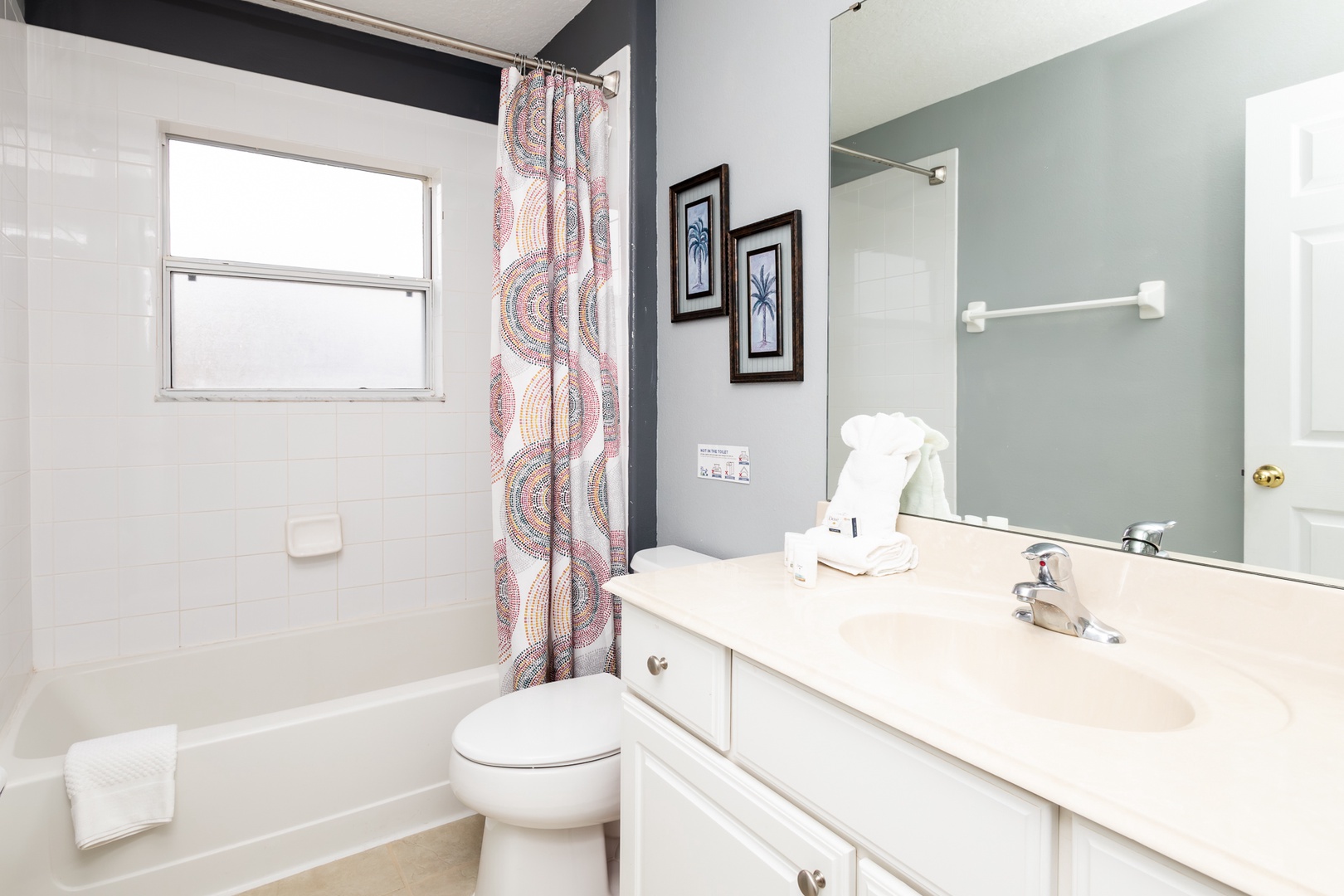 The shared second floor full bath includes a single vanity & shower/tub combo