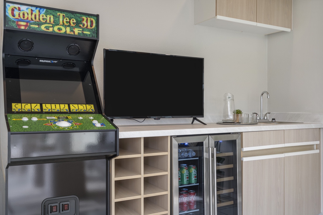 Enjoy a round of arcade golf while cocktails are curated