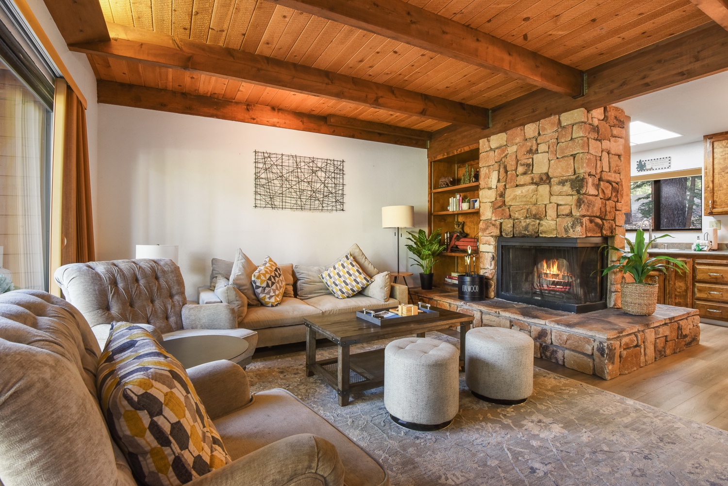 Unit #3: Curl up for a snooze or a movie by the fire in the elegant, plush living room