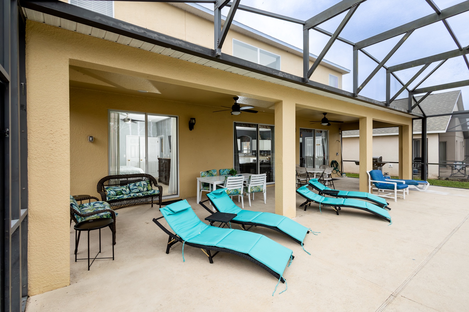 Dine alfresco or enjoy a cocktail on the screened patio