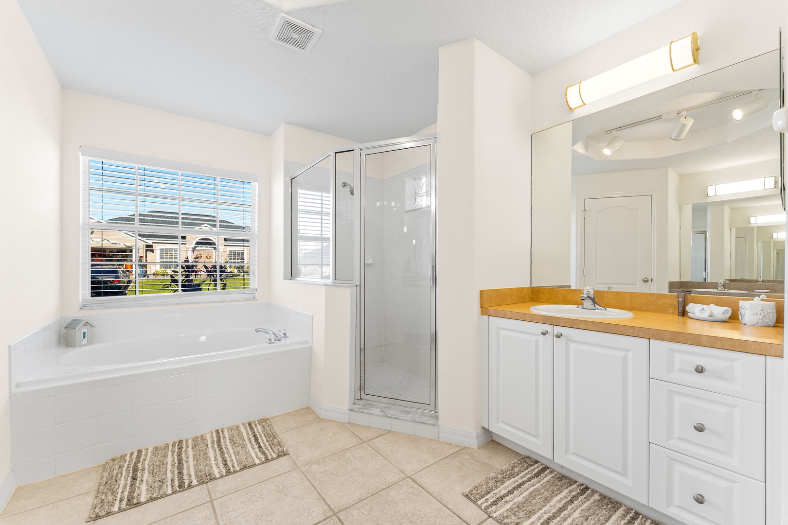 Ensuite bathroom with separate shower, and tub