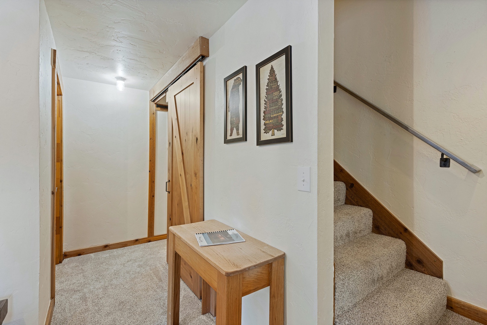 Head downstairs to the lower level to find an additional bedroom & bathroom