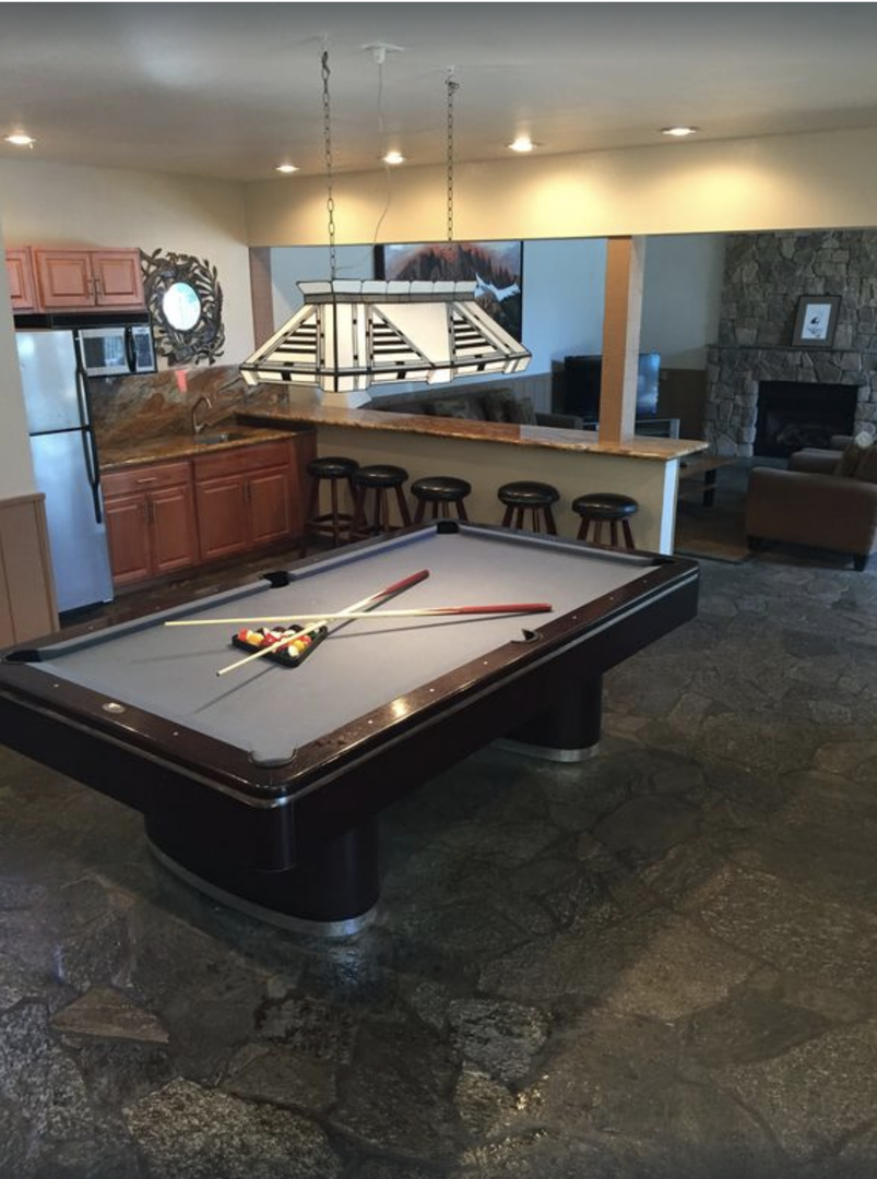 Rec room pool table, fridge, big screen TV, fireplace (ping pong upstairs)