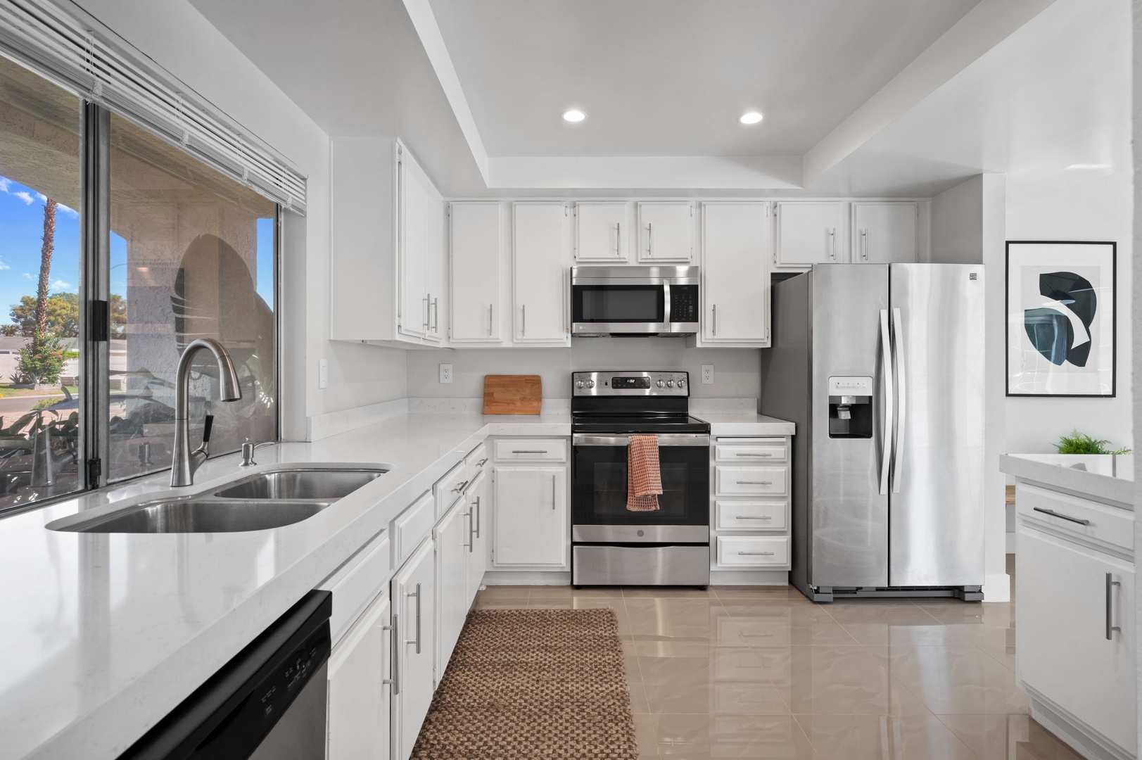 Enjoy all the comforts of home & ample storage/counter space in the kitchen