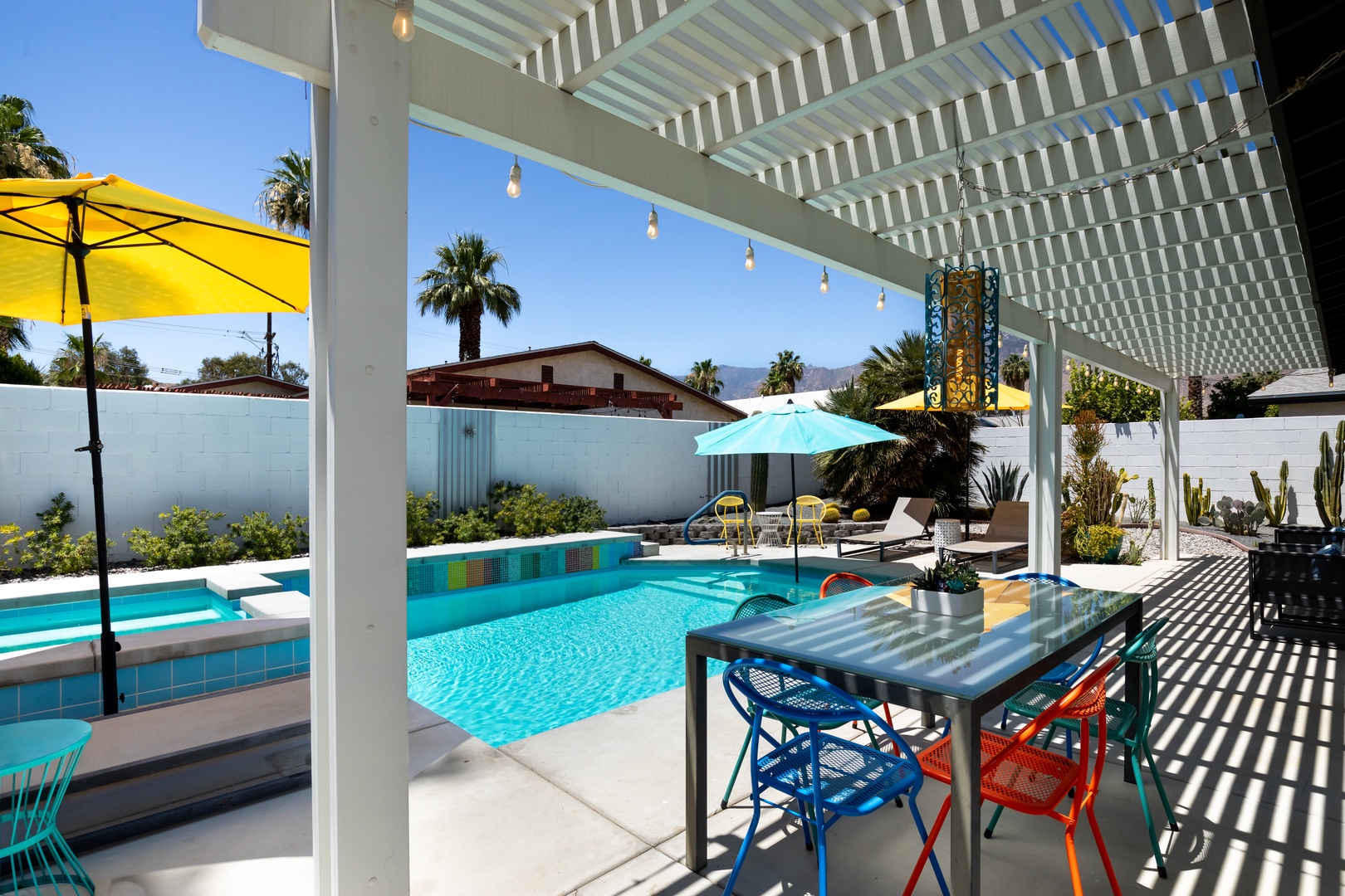 Lounge & dine in the shade, just steps away from the saltwater pool