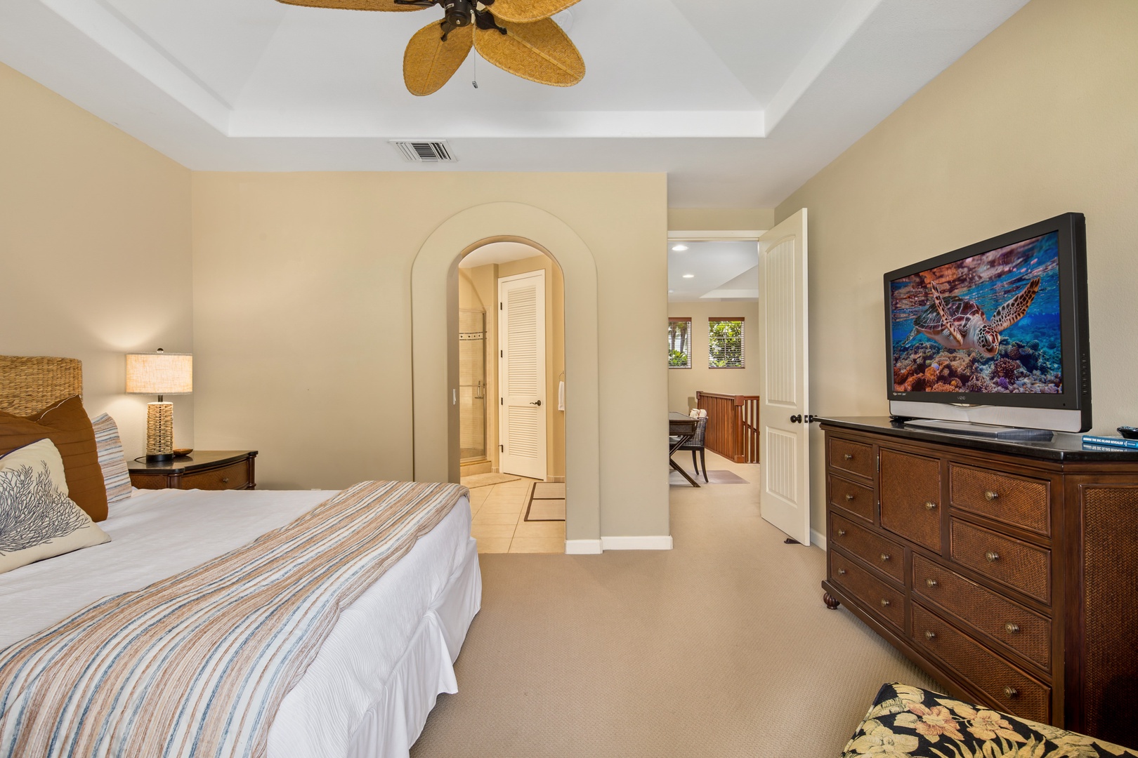 Bedroom 1 with King bed, Smart TV, balcony, and en-suite
