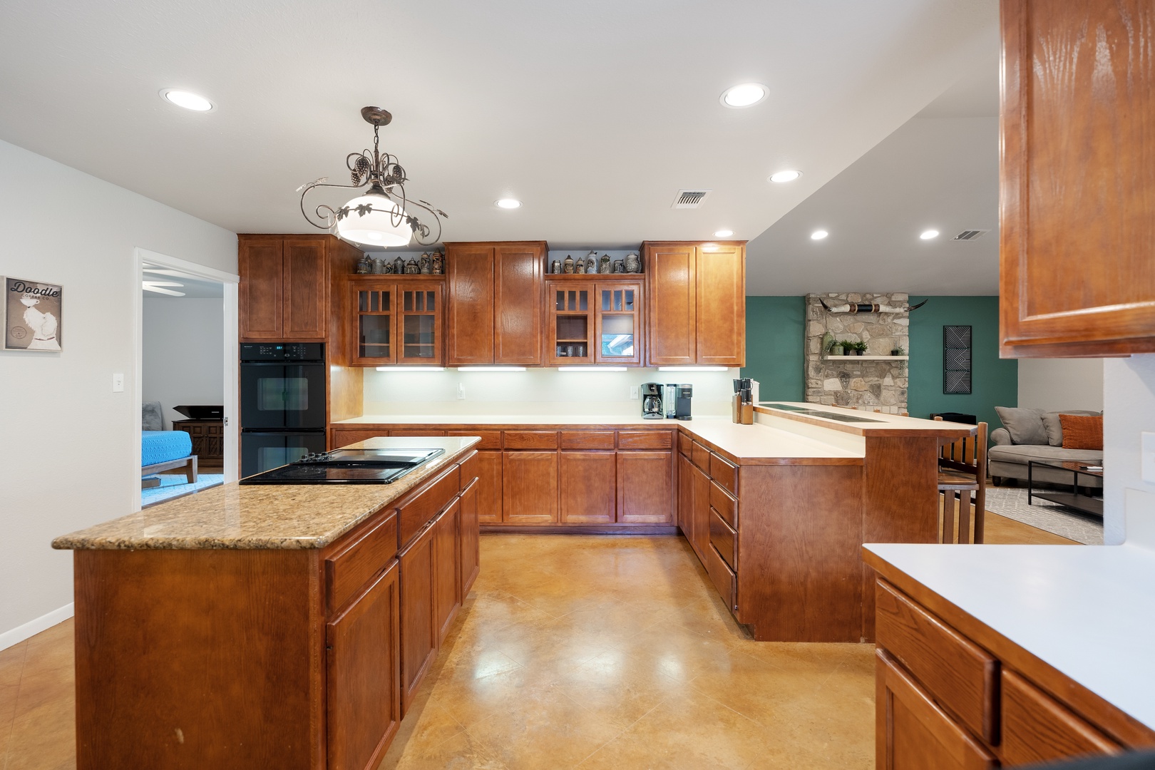 The kitchen is spacious and open, with all the comforts of home