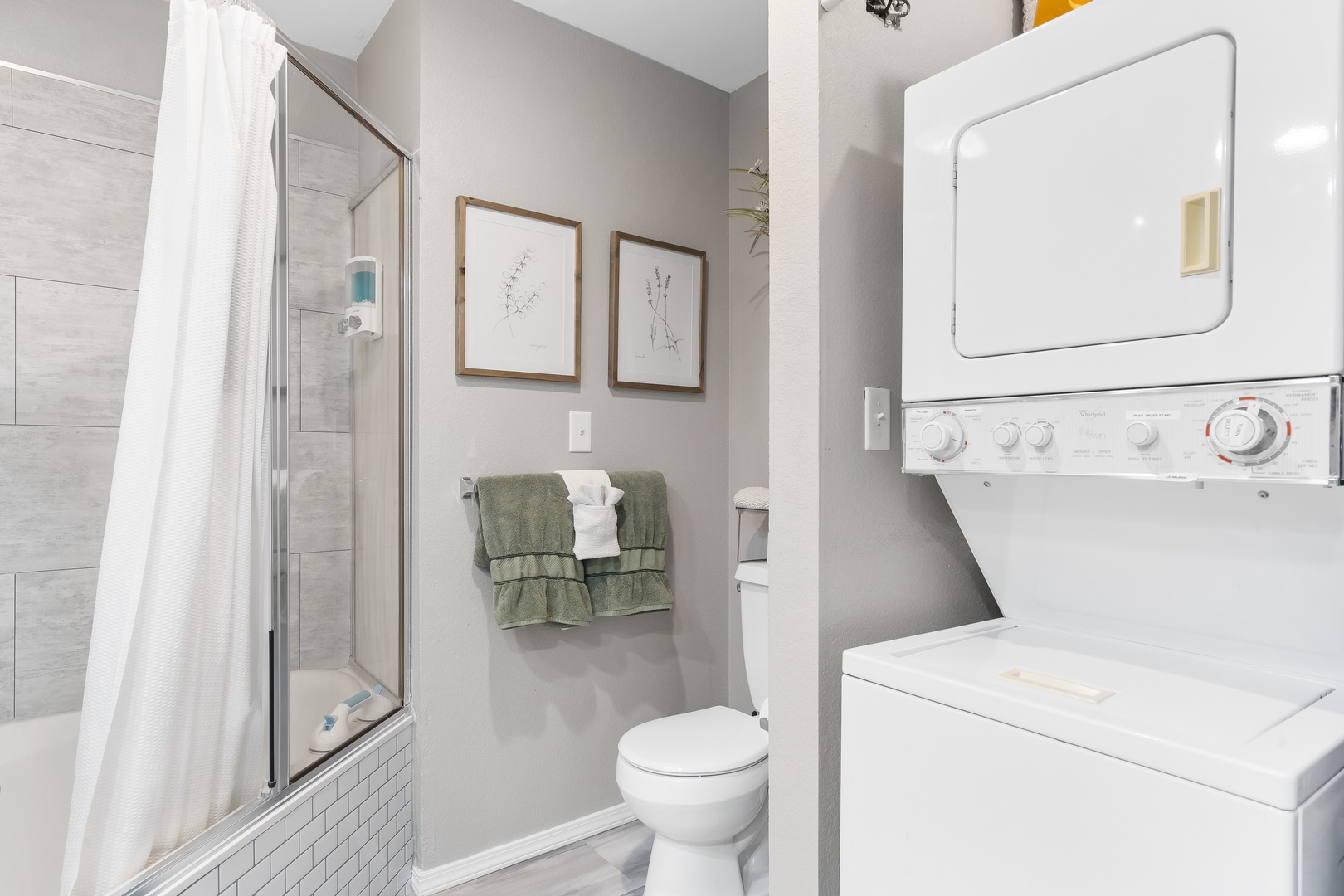 This ensuite bath features a double vanity & shower/soaking tub combo