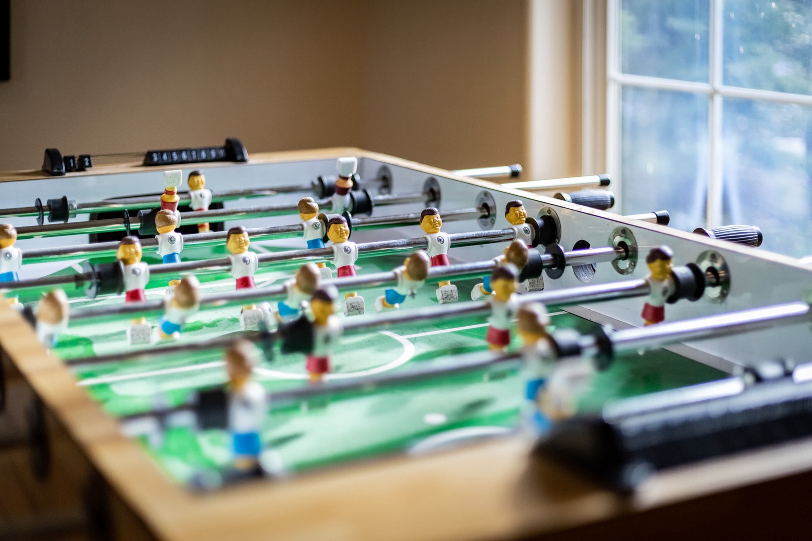 Foosball table in living room, great for the kids