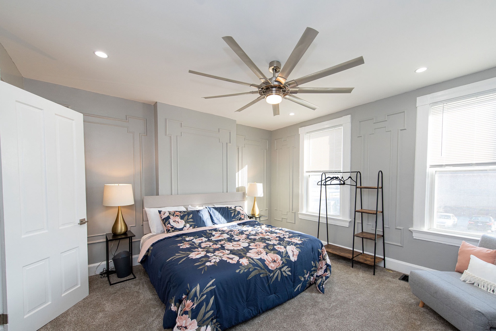 Suite 2 – The primary bedroom offers a king bed, Smart TV, & ceiling fan