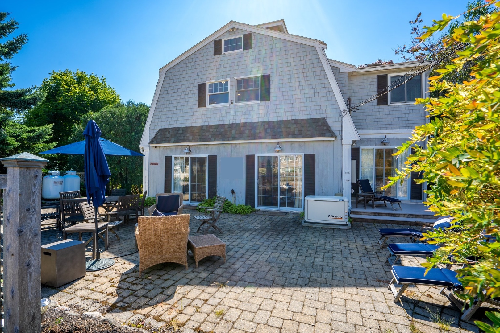 Inviting front patio with cozy fire pit for relaxation