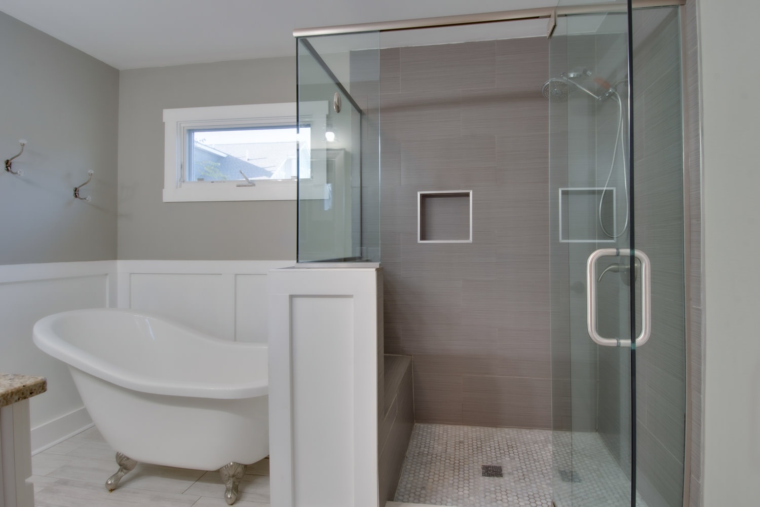 Master bedroom en suite with separate claw tub, and stand up shower