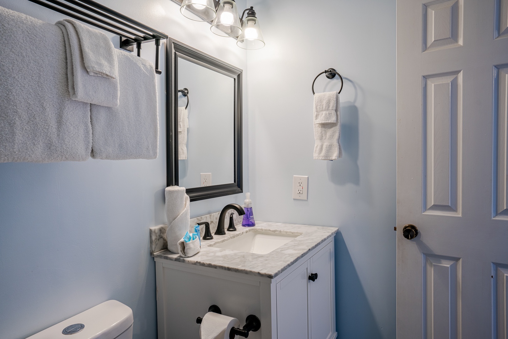 The second bedroom ensuite contains a single vanity & glass shower