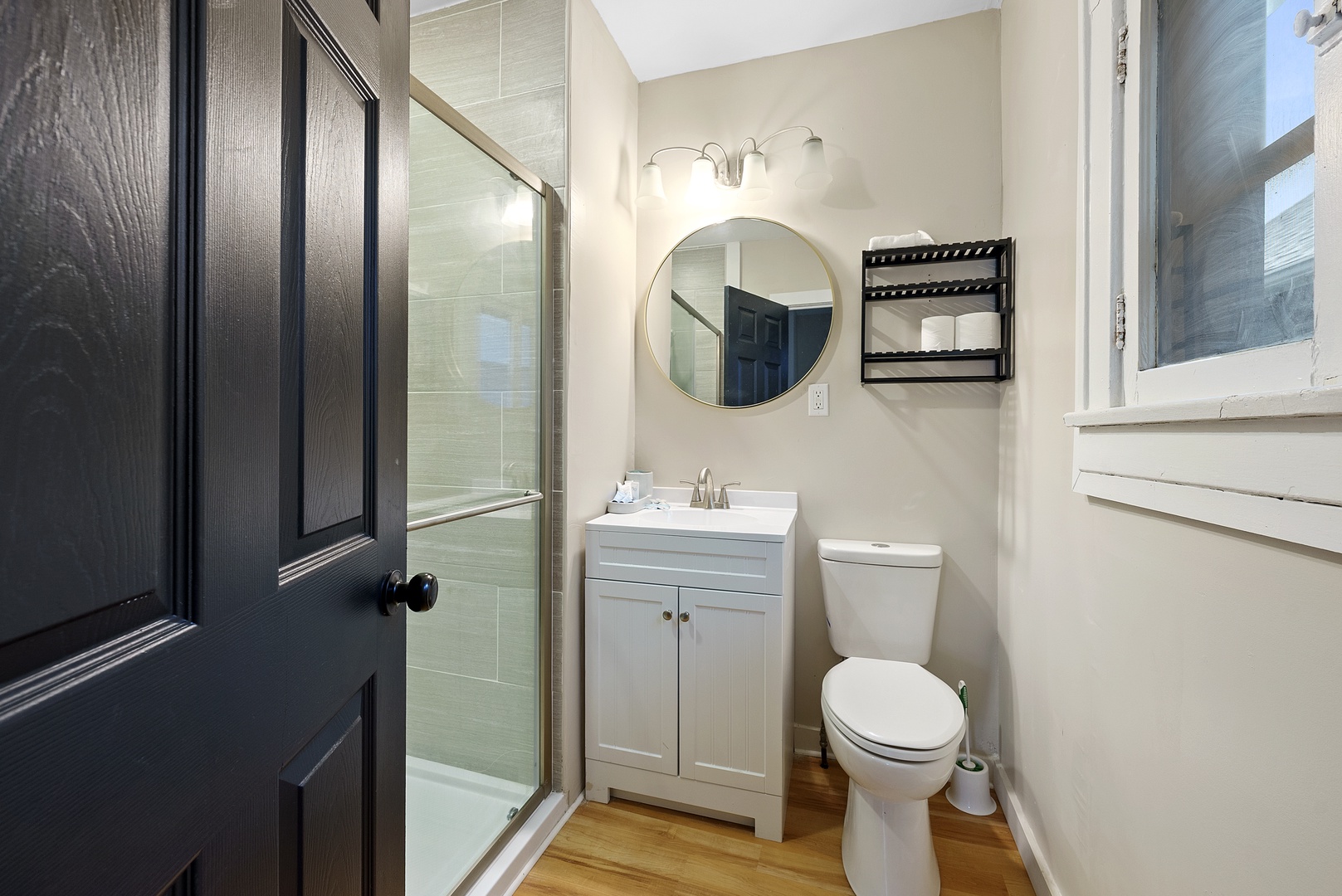 A single vanity & glass shower await in the 2nd-floor full bathroom