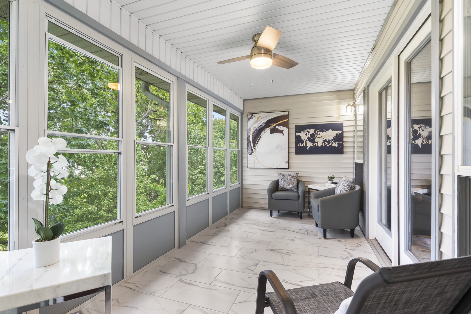 Lounge the day away with views & a great book in the tranquil sunroom