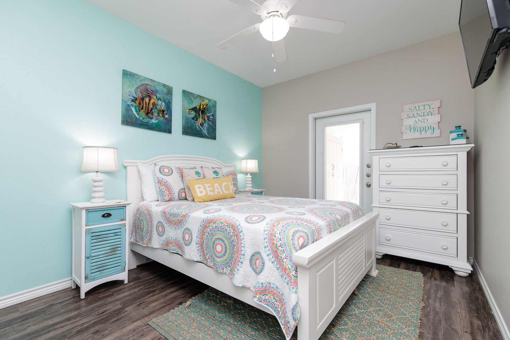The 2nd of 3 bedrooms on the first floor offers a queen bed & Smart TV