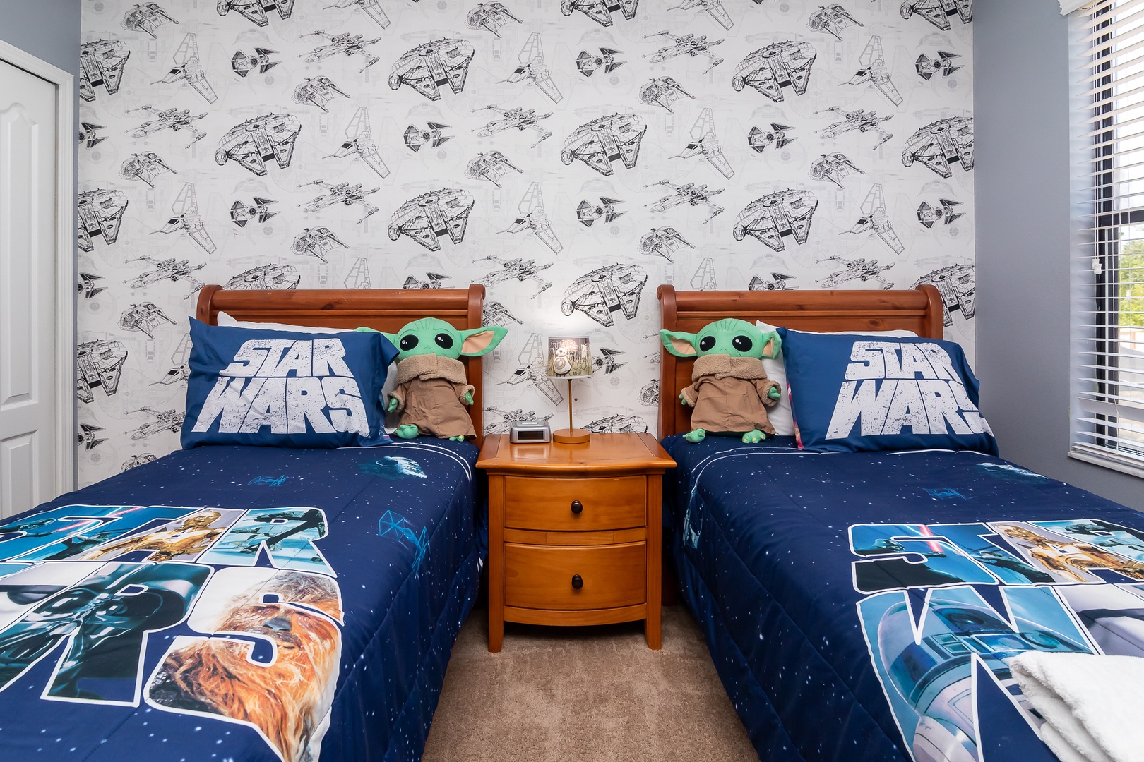 Bedroom 5 Star Wars themed with 2 Twin beds, TV, and Jack & Jill style en-suite (2nd floor)