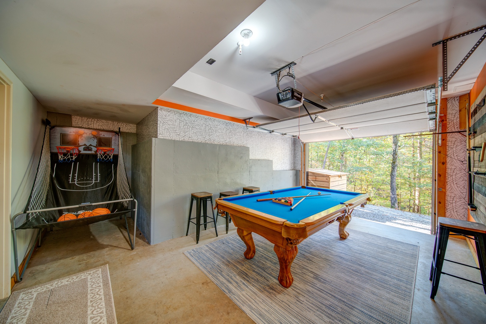 Open the garage doo and have open air concept game room