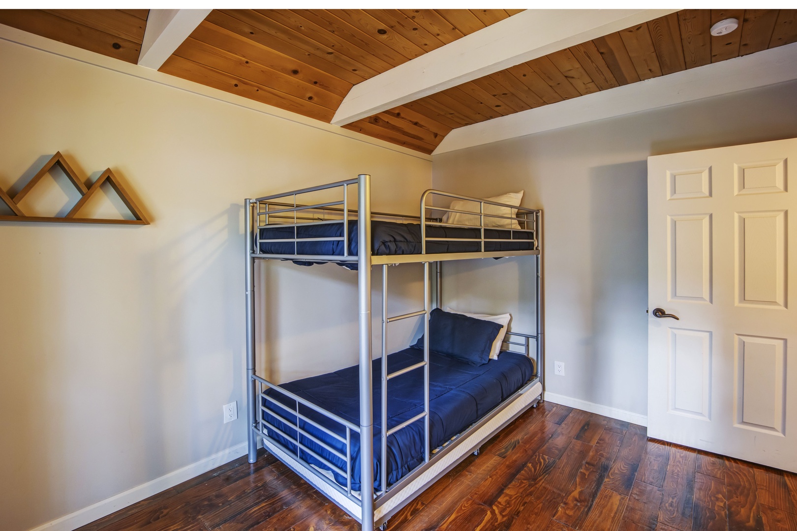 Bedroom 2 features a bunk bed