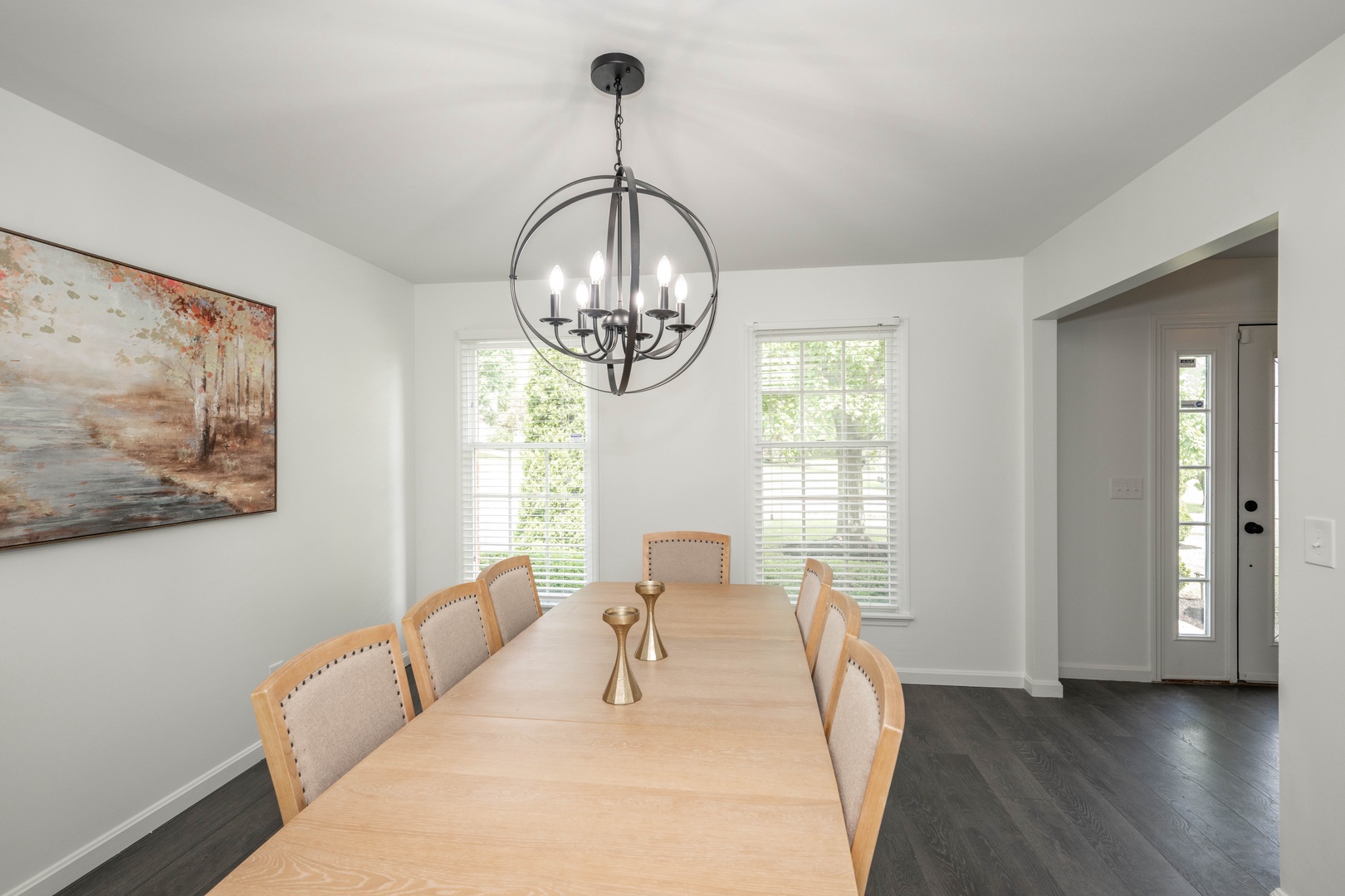 Formal dining area with table and seating for 8