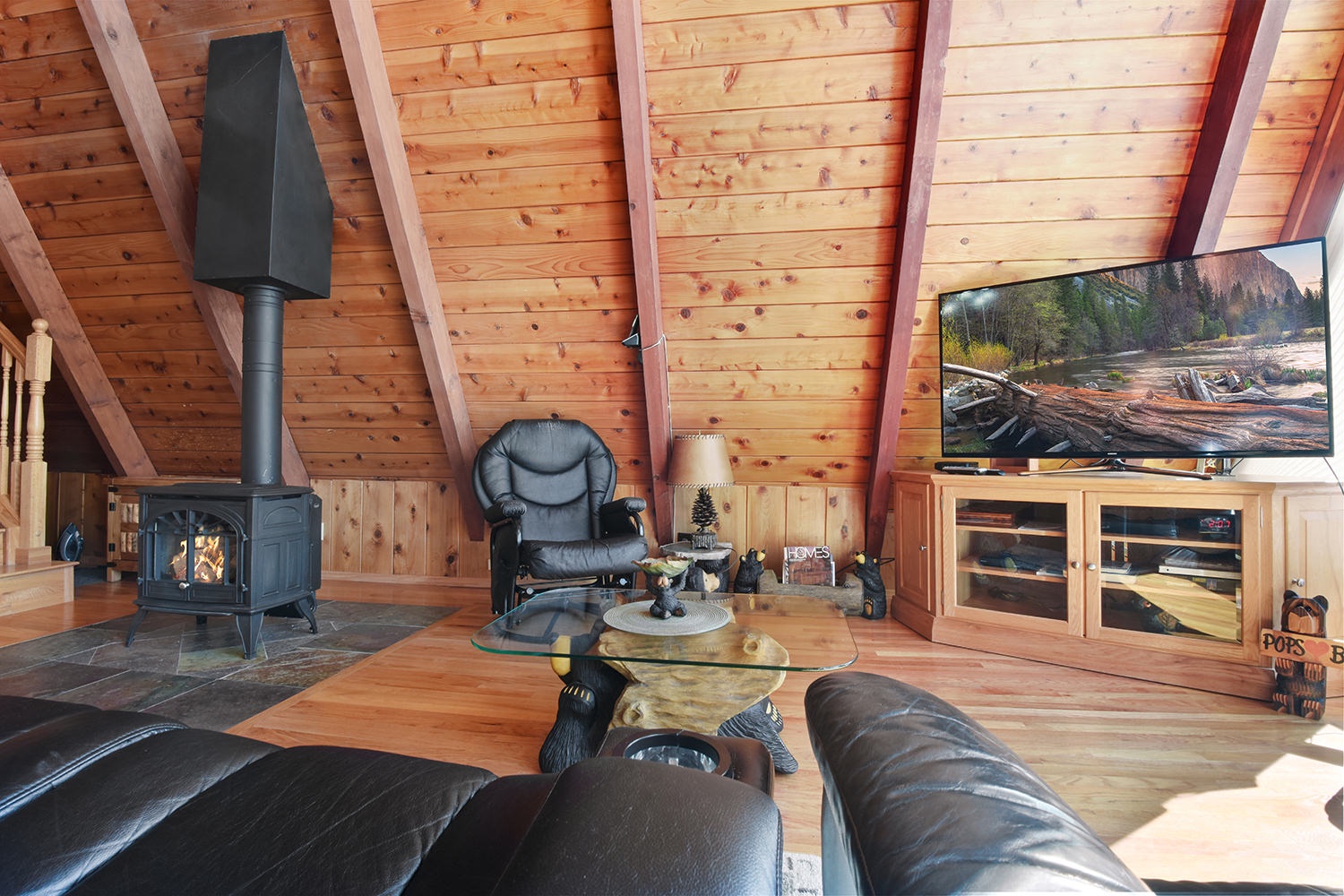 Living room with TV, and fireplace