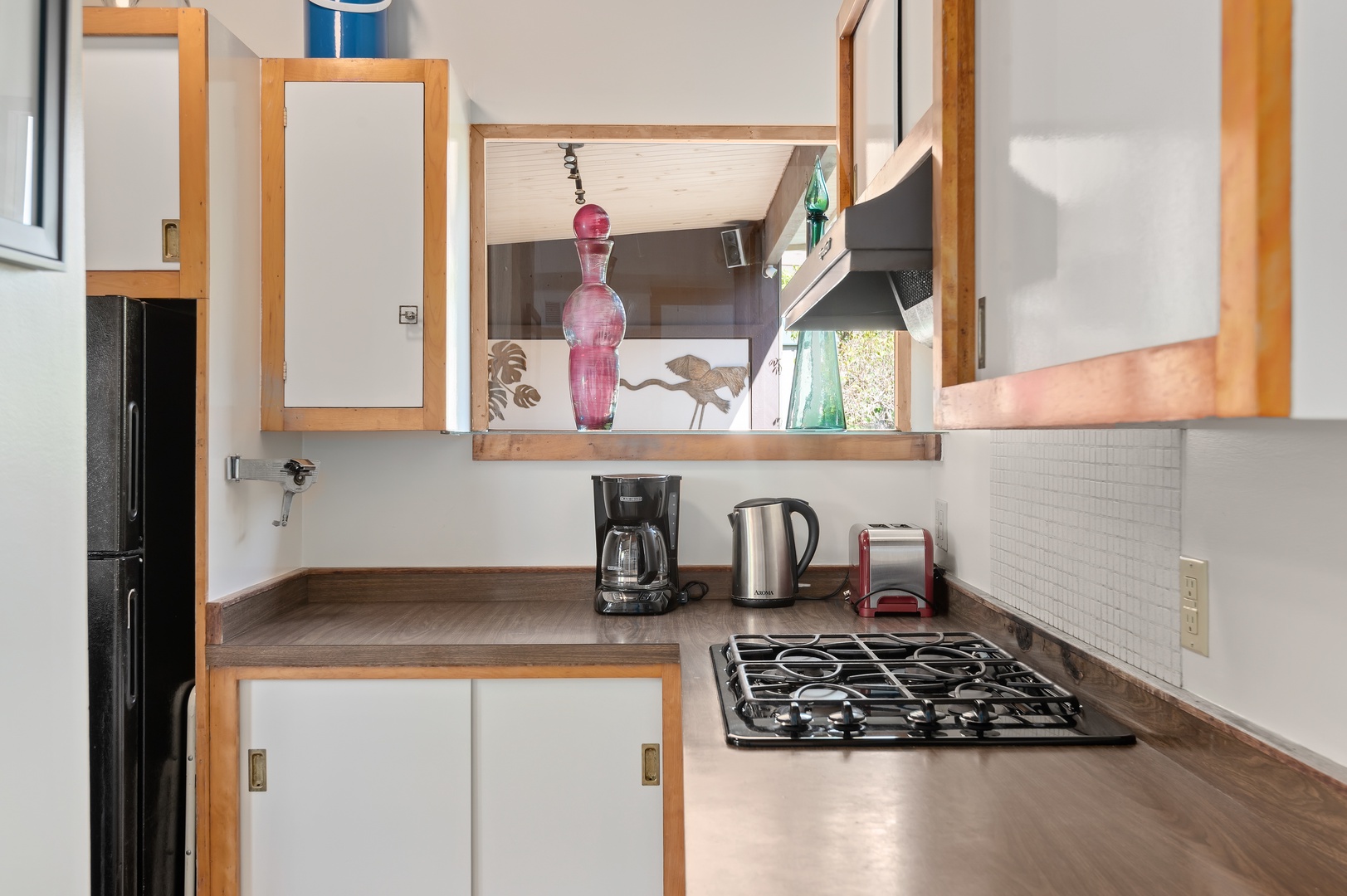 An efficient, well-appointed kitchen awaits you
